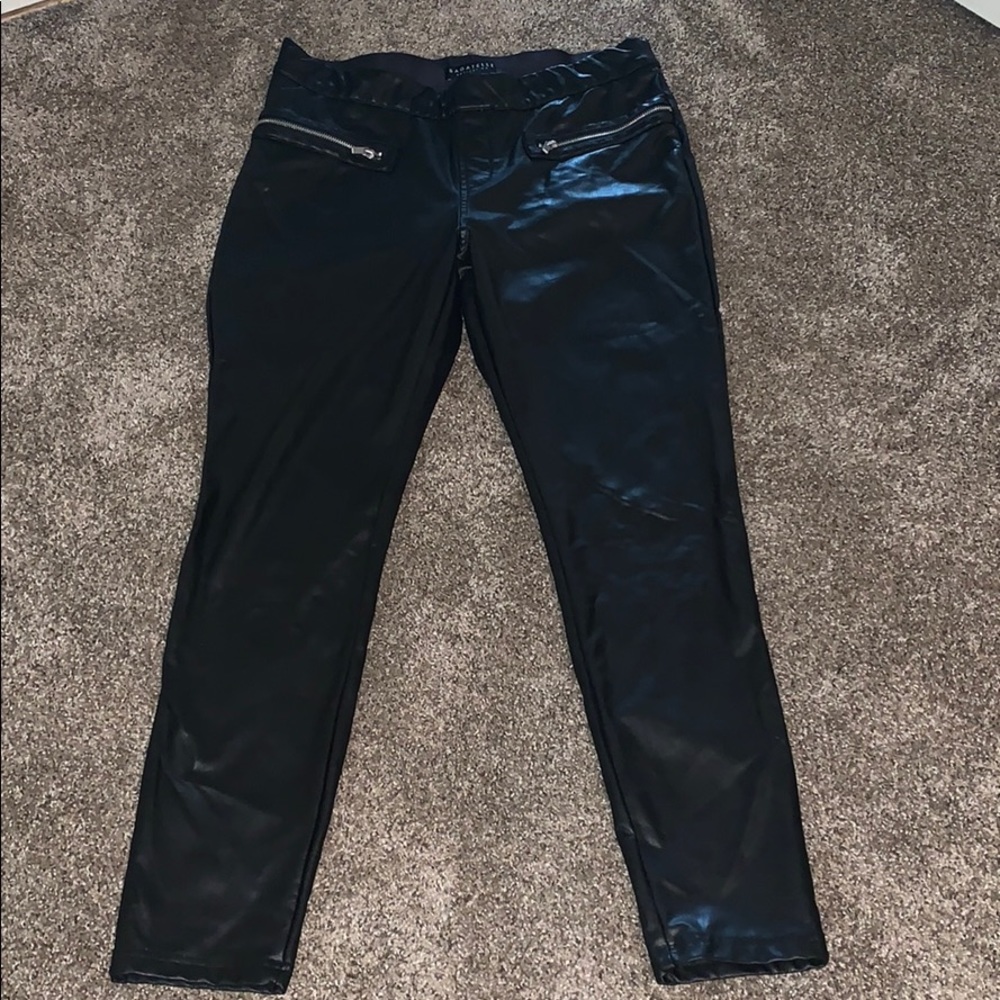 Faux leather skinnies with faux zipper pockets